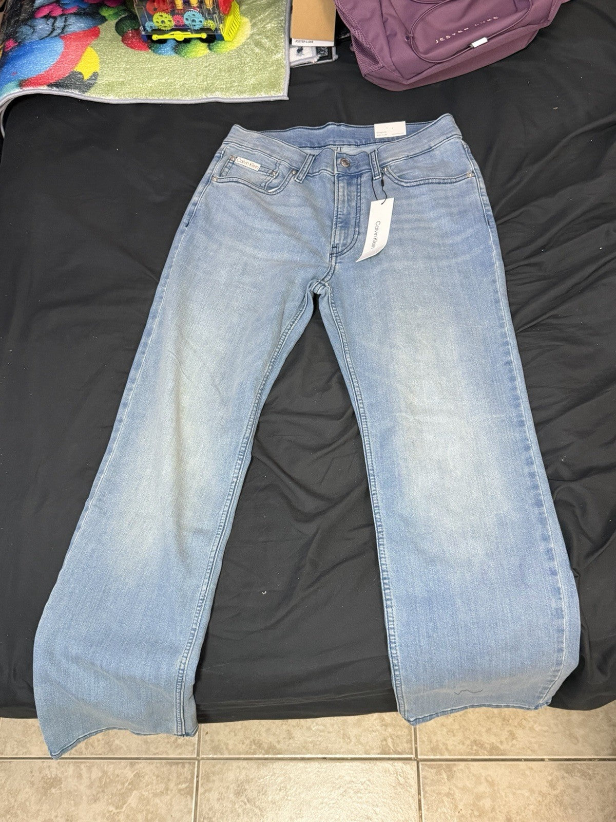 Calvin Klein Jeans Men's Straight Fit Blue Denim Jeans Solid 5-Pocket Logo